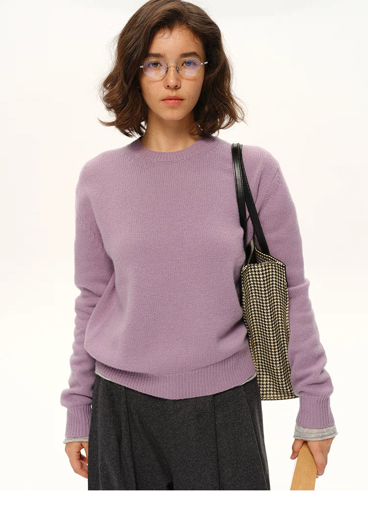 Soft lavender cashmere-blend crewneck sweater paired with a houndstooth tote.