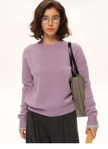 Soft lavender cashmere-blend crewneck sweater paired with a houndstooth tote.