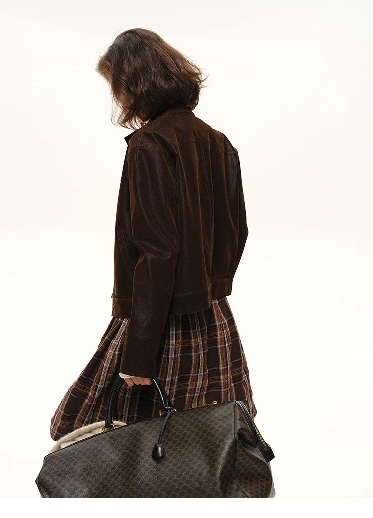 Back view of cocoa suede-look moto jacket showing structured hem and smooth faux-suede texture.