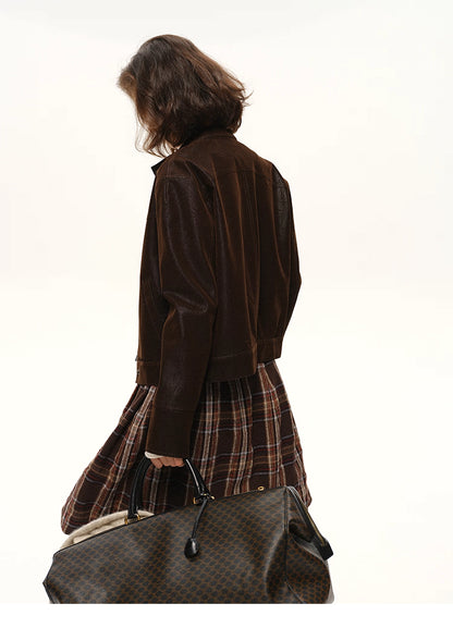 Back view of cocoa suede-look moto jacket showing structured hem and smooth faux-suede texture.
