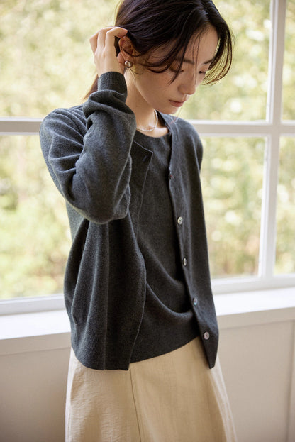 Close-up of cardigan texture and genuine shell buttons