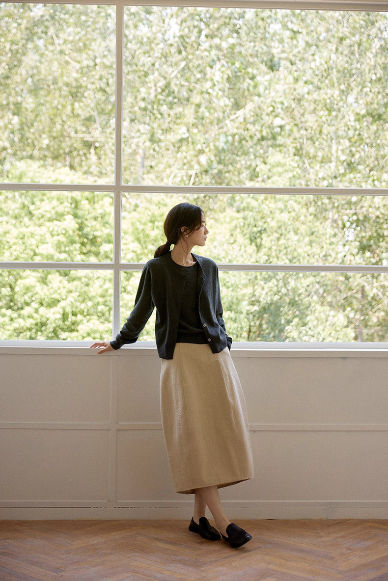 Side view of soft wool twin-layer cardigan showing relaxed silhouette