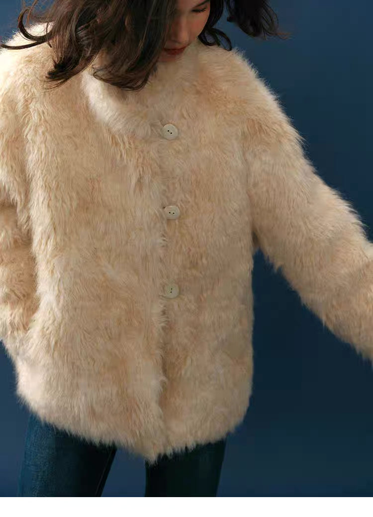 Lower-angle front shot showing button details and plush pile texture
