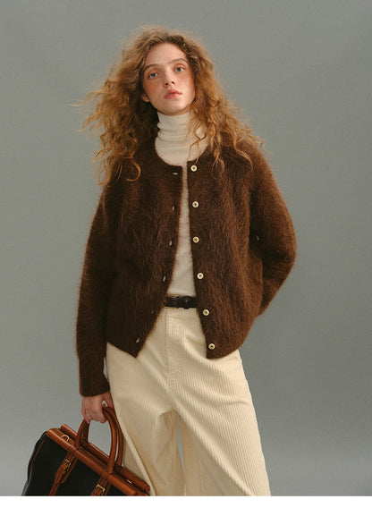 Deep Caramel Brown alpaca fuzzy cardigan styled with cream pants and handbag