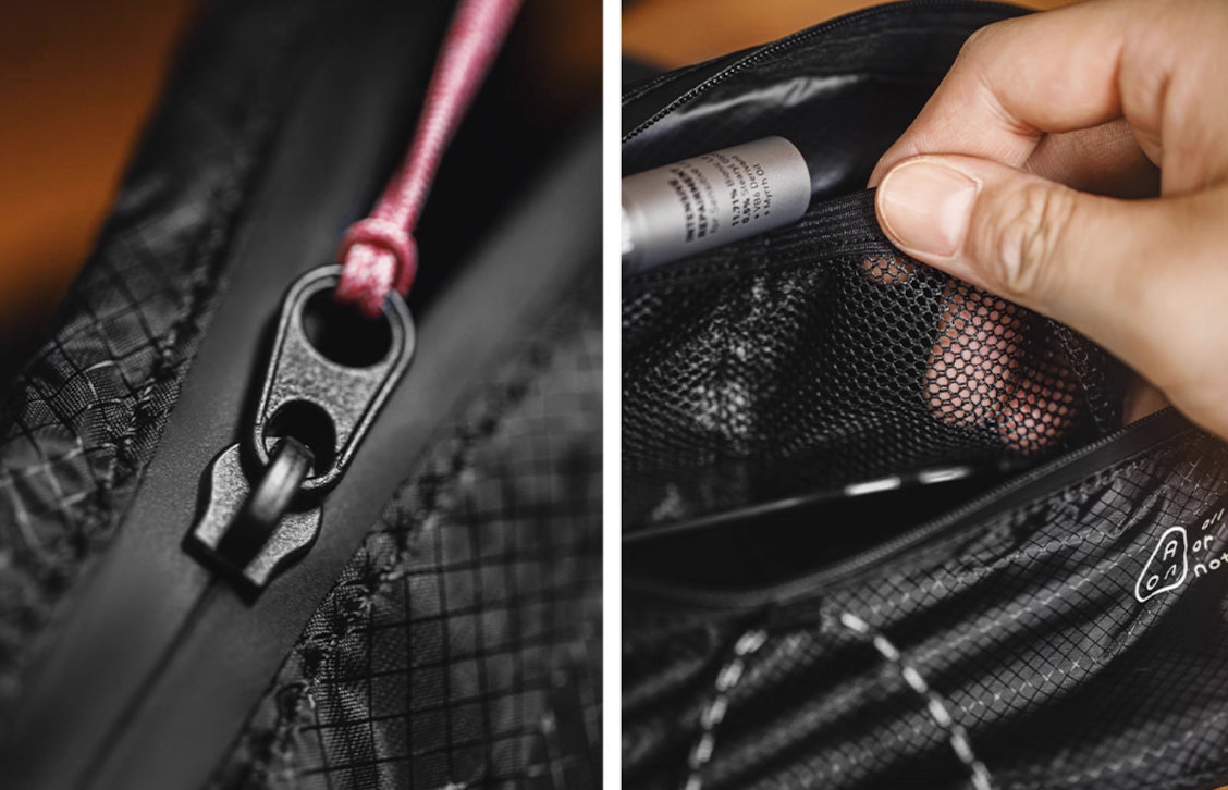 Close-up of water-resistant zipper and mesh inner pocket of AON bag