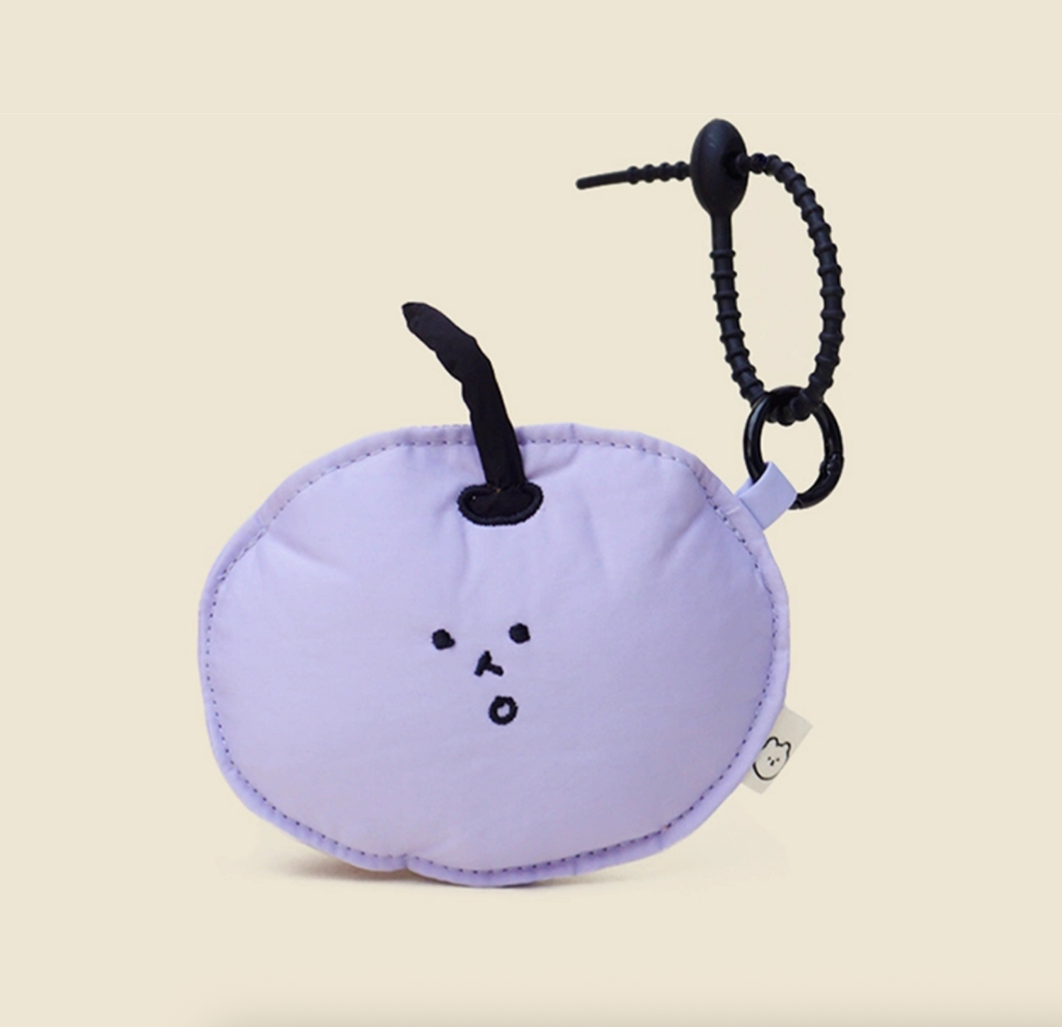 Purple apple face mini pouch keychain with cute embroidered face.