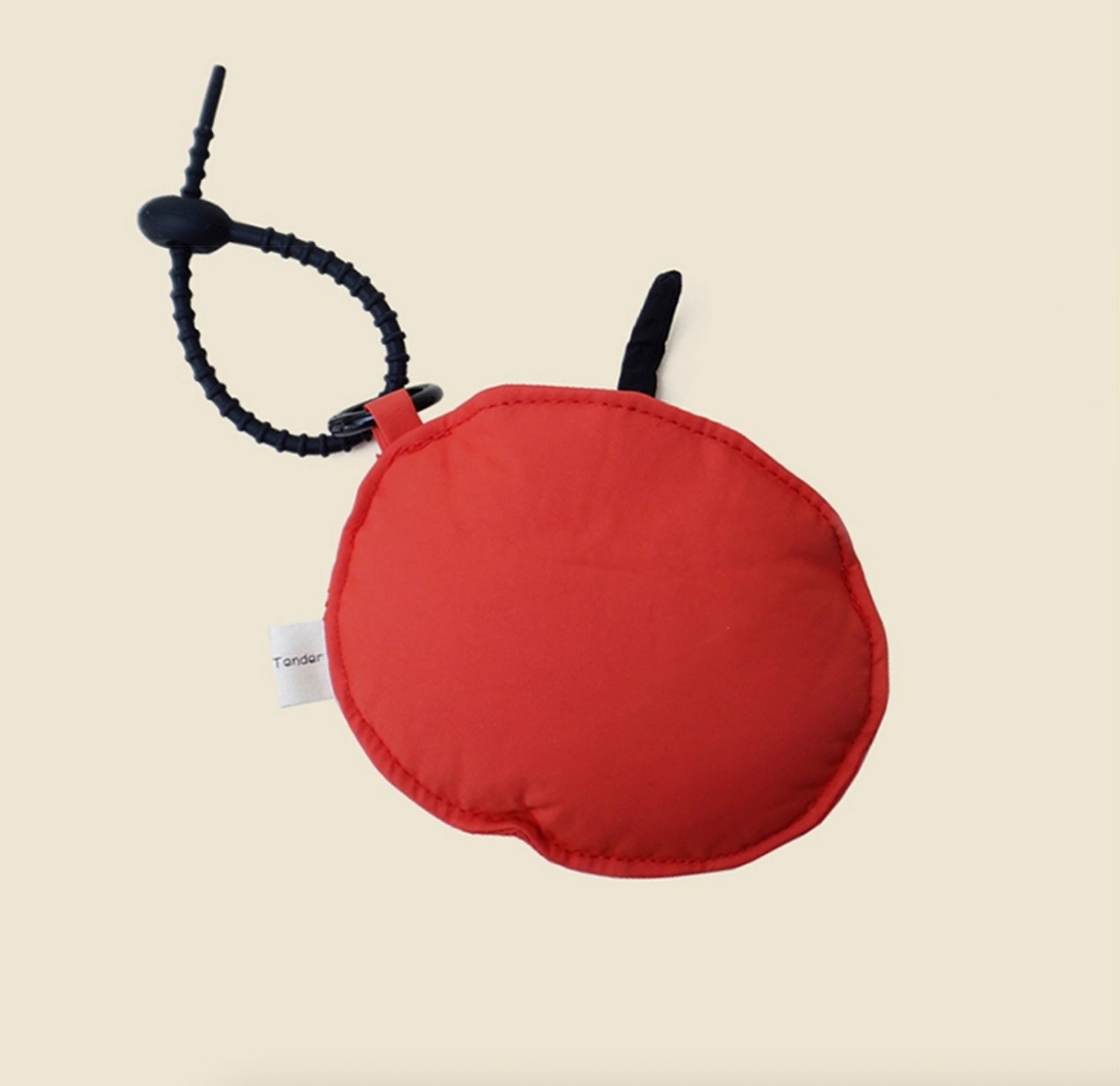 Back view of red apple face mini pouch keychain with soft strap.