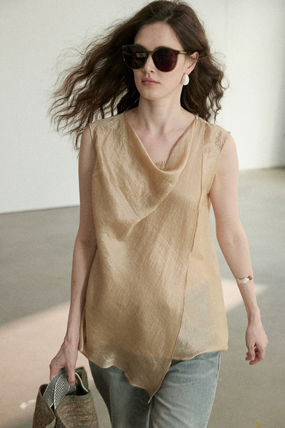 Close-up of Apricot cowl neck top showing sand-washed texture and soft sheen