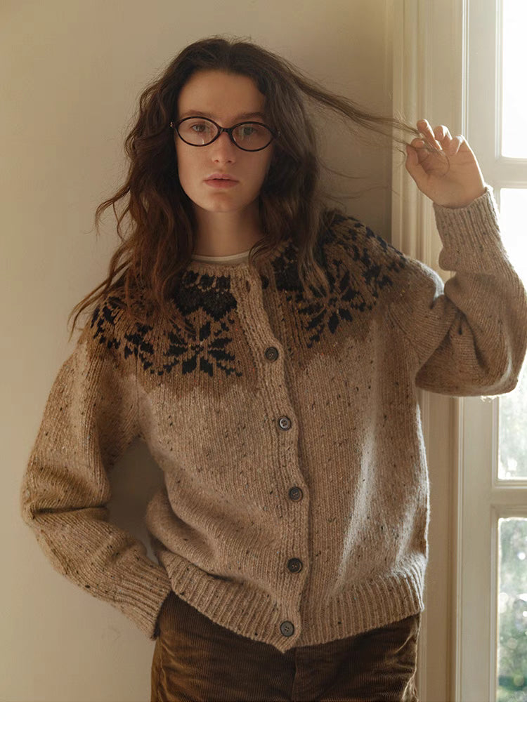 Khaki aran knit cardigan with dark fair isle yoke front view showing button front and textured wool knit