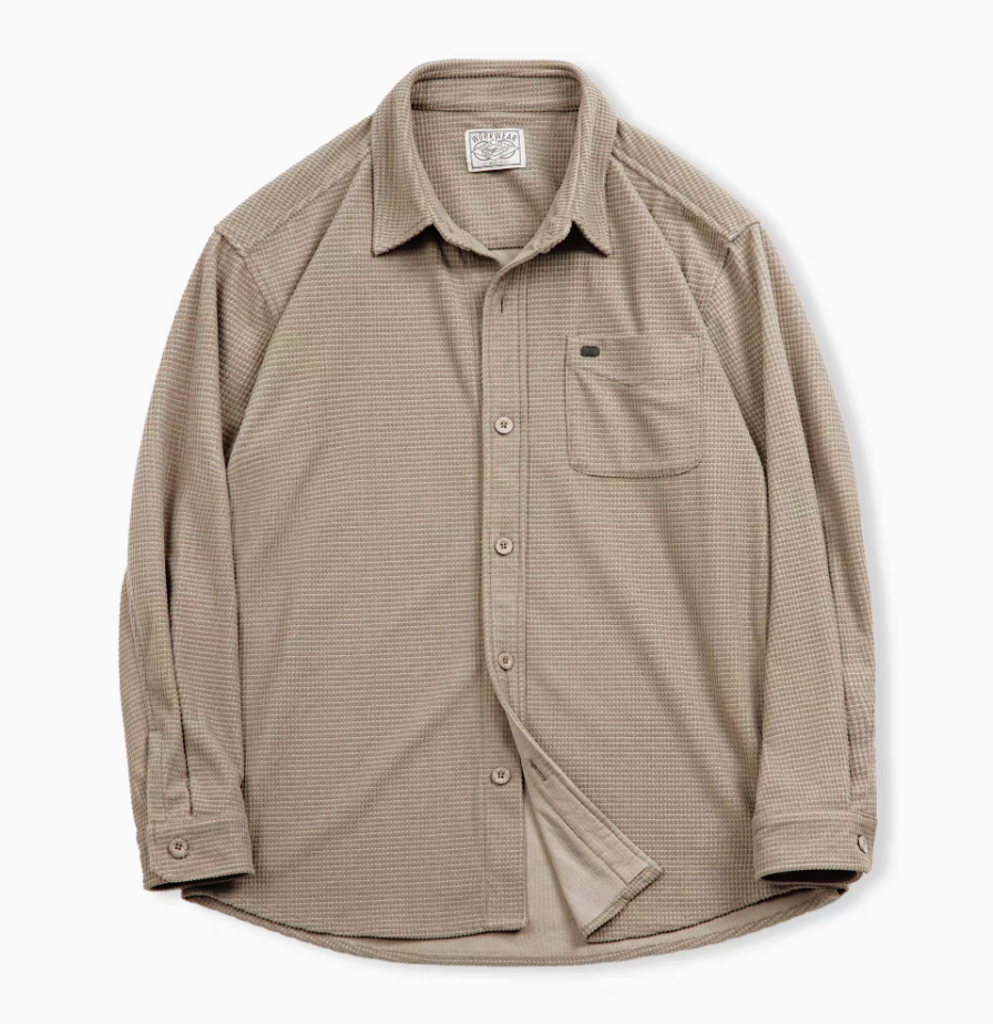 Camel architectural grid-texture long sleeve shirt flat lay front view showing structured fabric, button front closure, and chest pocket detail