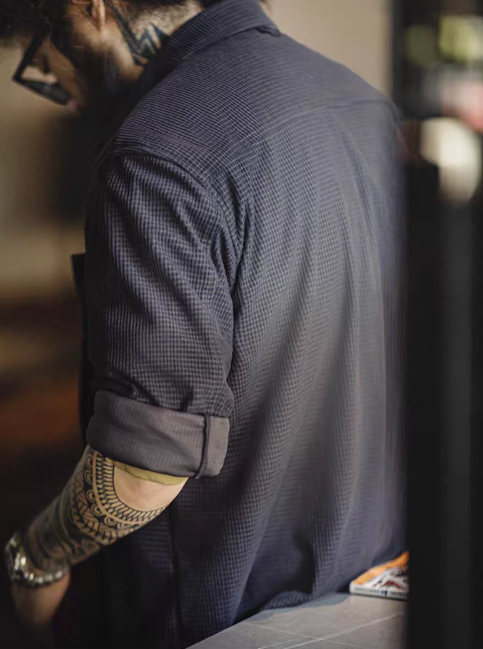 Dark Gray grid-texture long sleeve shirt back side view with rolled sleeves showing fabric texture and relaxed silhouette