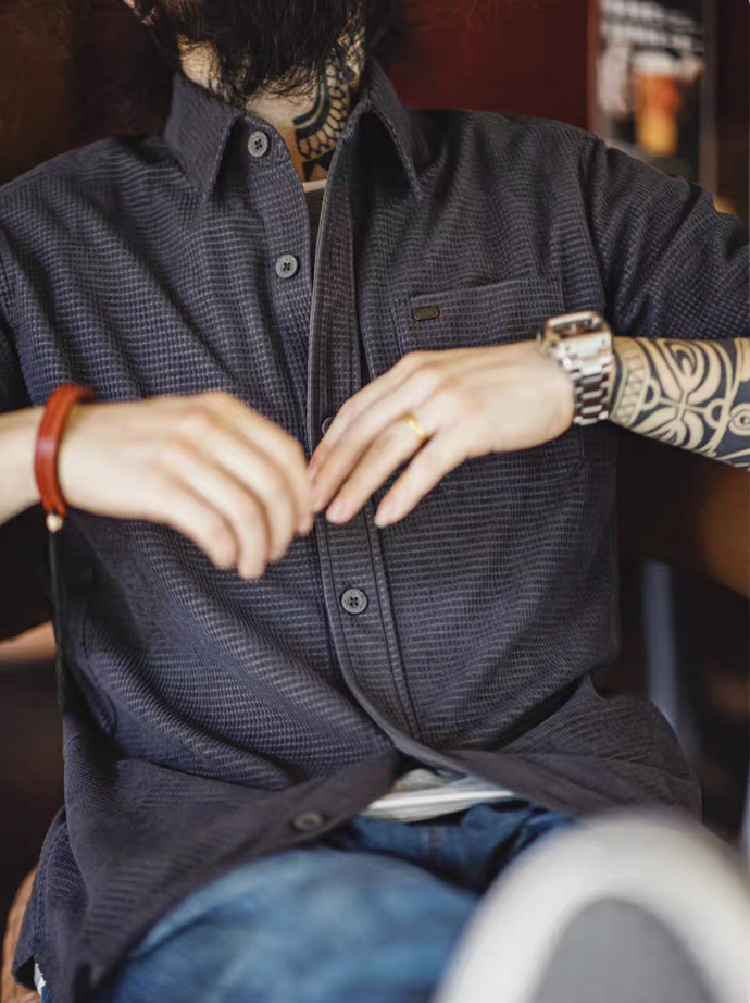 Dark Gray textured long sleeve shirt worn front view highlighting button placket, chest pocket, and soft structured fabric