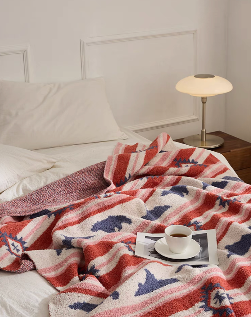 Detailed view of Red Embroidered Bear blanket texture with visible stitching and soft fleece surface
