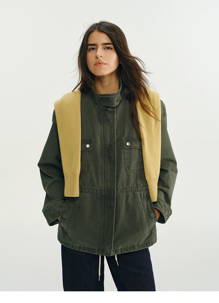 Army green field jacket with stand collar, flap chest pockets, and lower pockets