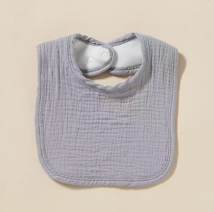 Gray baby cotton gauze bib with soft breathable fabric and snap closure