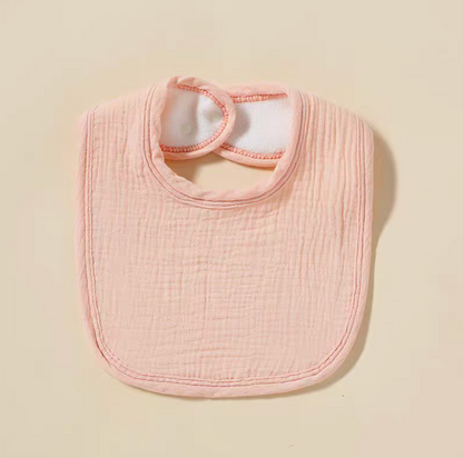 Light Pink baby cotton gauze bib with soft texture and adjustable snap closure