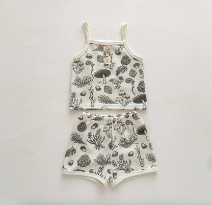 Baby waffle knit set in woodland sketch print laid flat on white background