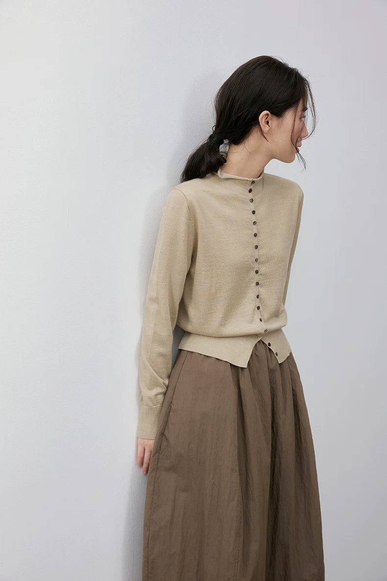 Beige wool cardigan, back view on model