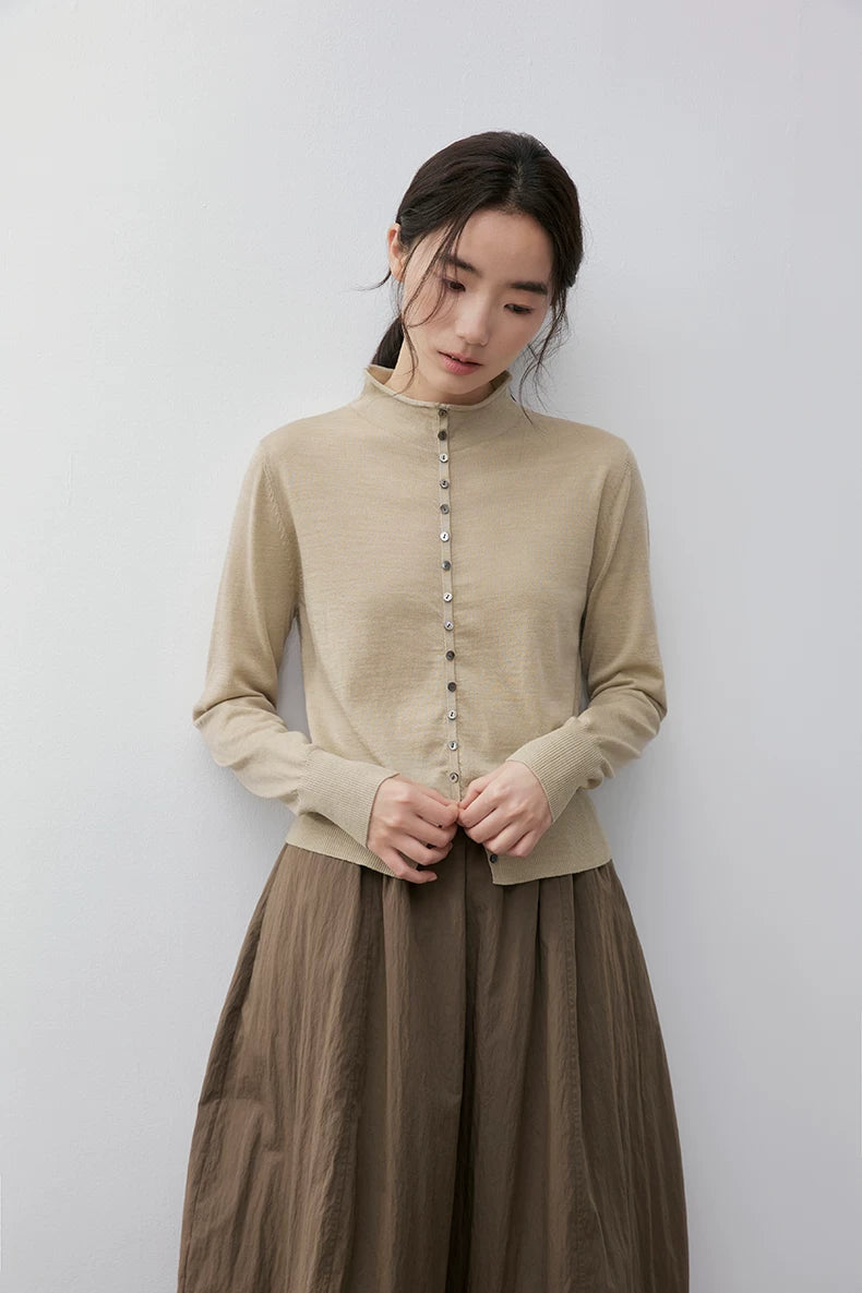 Beige wool cardigan, front view on model