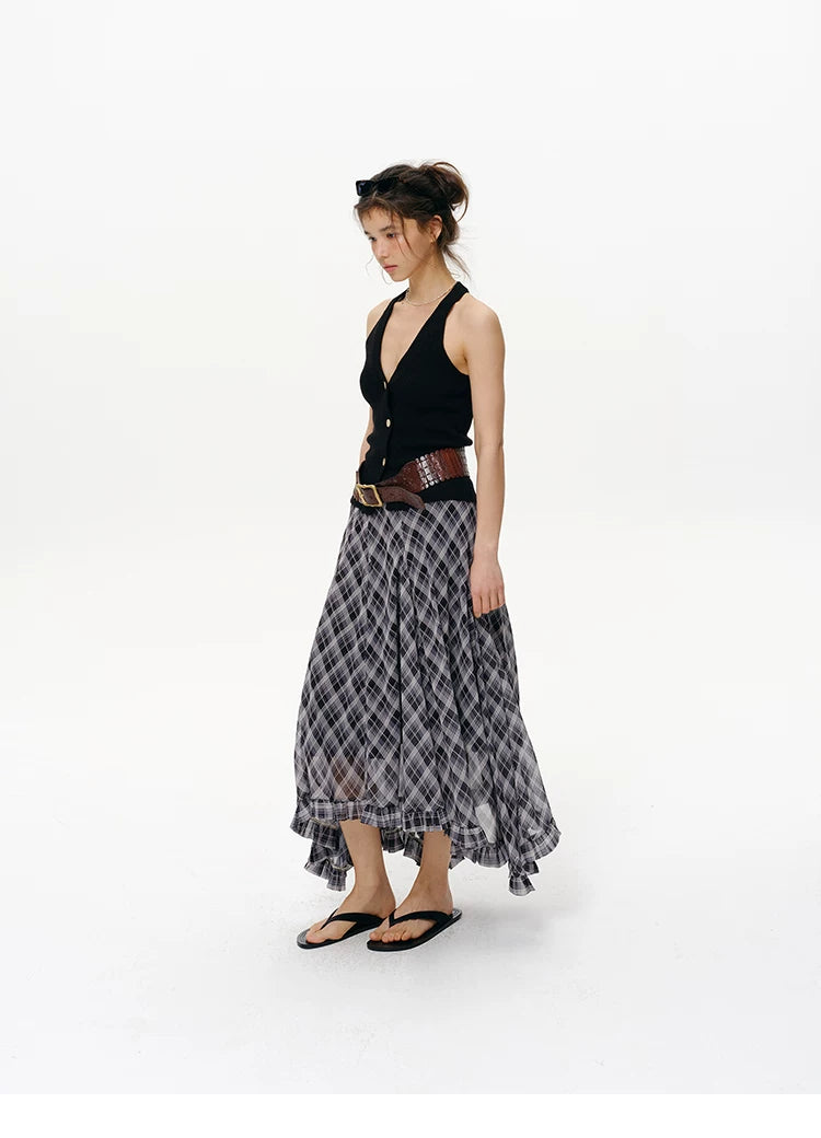 Full-length front view of Black halter knit vest with gold-tone button front