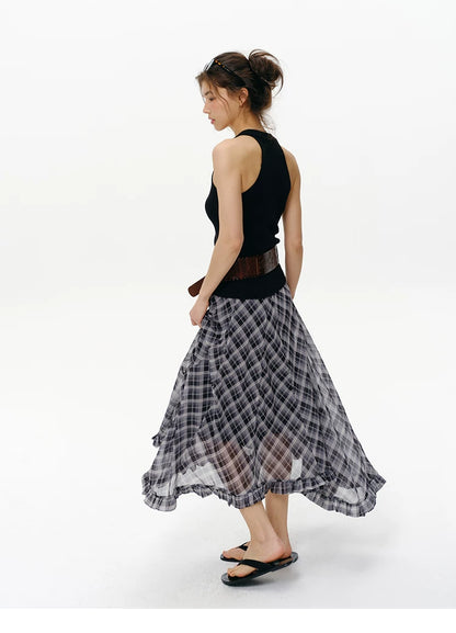 Back view of Black ribbed halter knit vest showing cut-in shoulders