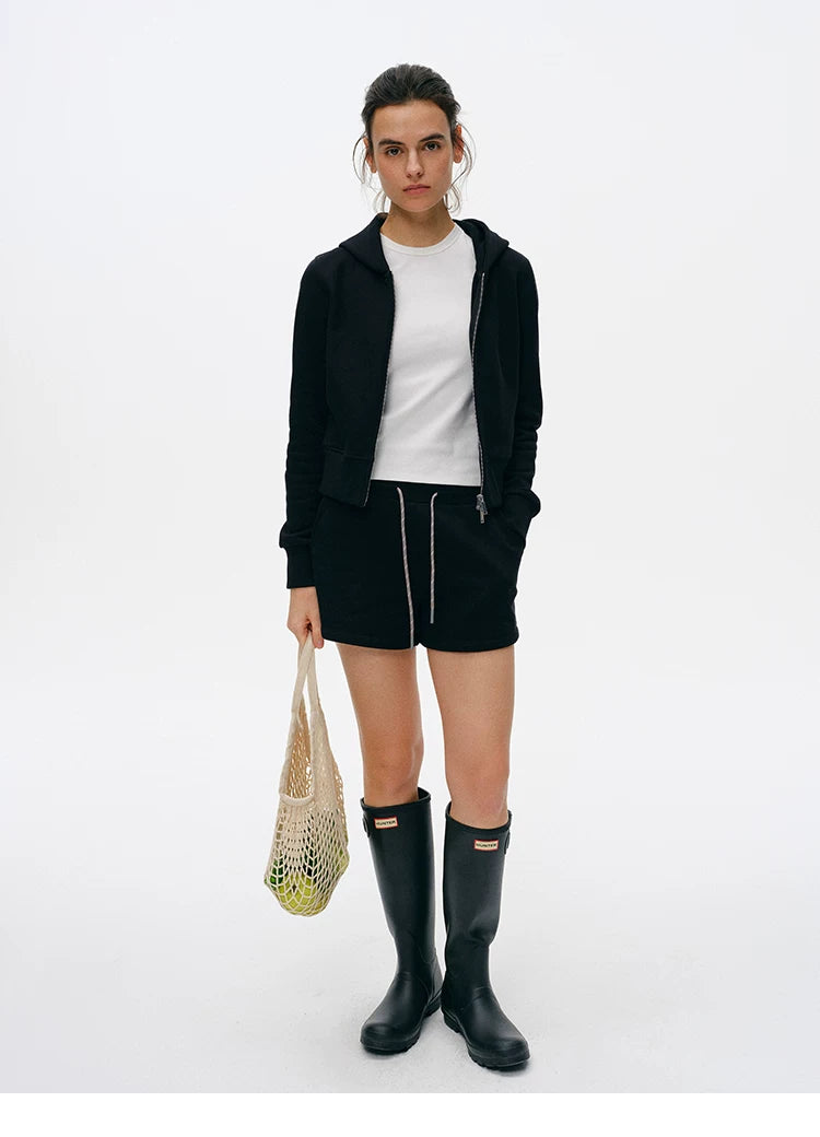 Full-length front view of Black cropped zip hoodie and drawstring shorts set
