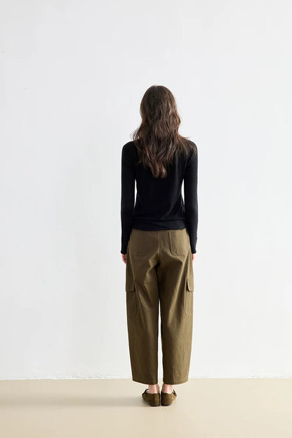 Black wool knit cardigan, back view on model