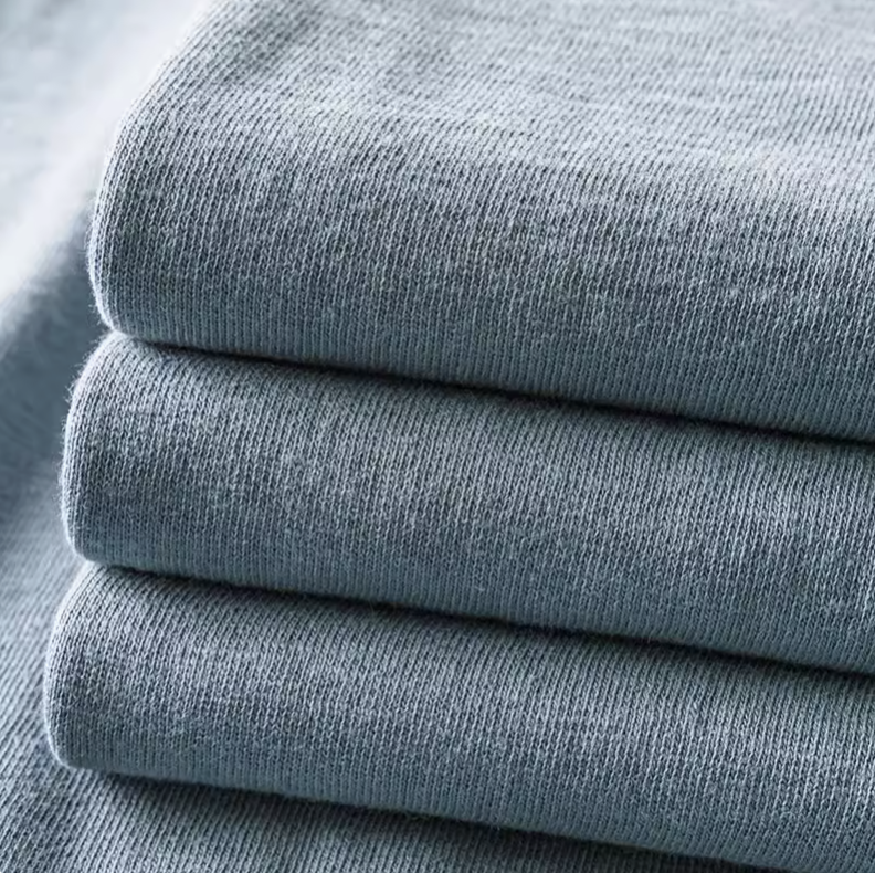 Blue Mist Crew Neck Tee blue color fabric texture close-up showing soft cotton material