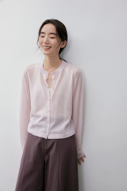 Blush Pink cashmere silk cardigan, close front view on smiling model