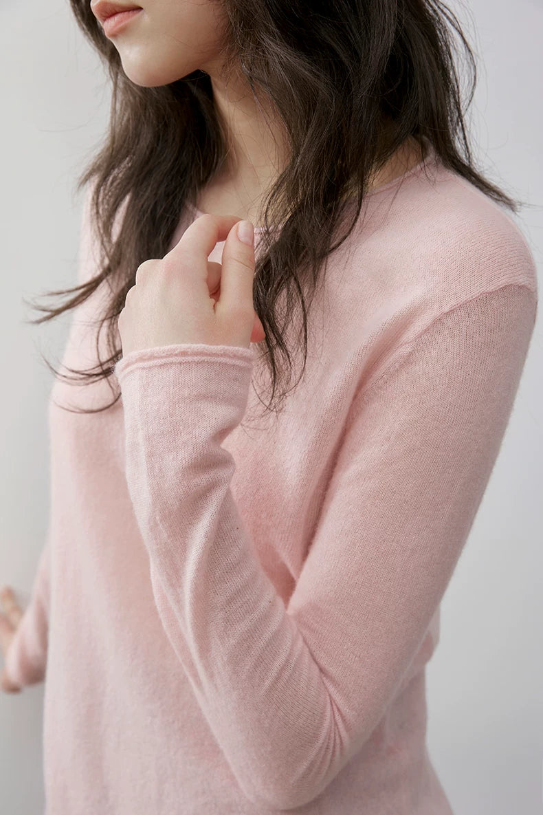 Blush Pink pullover, close-up of rolled round neckline