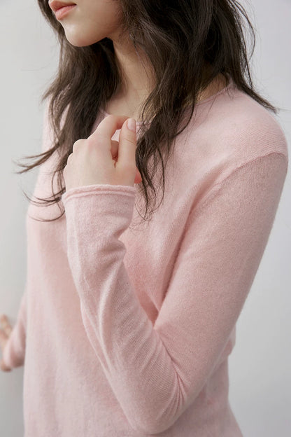 Blush Pink pullover, close-up of rolled round neckline