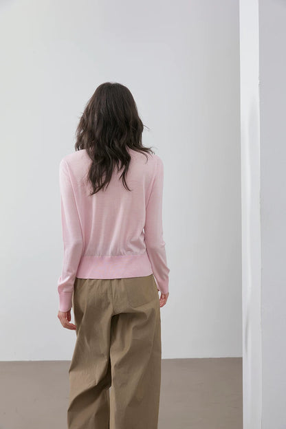 Blush Pink wool cardigan, back view on model