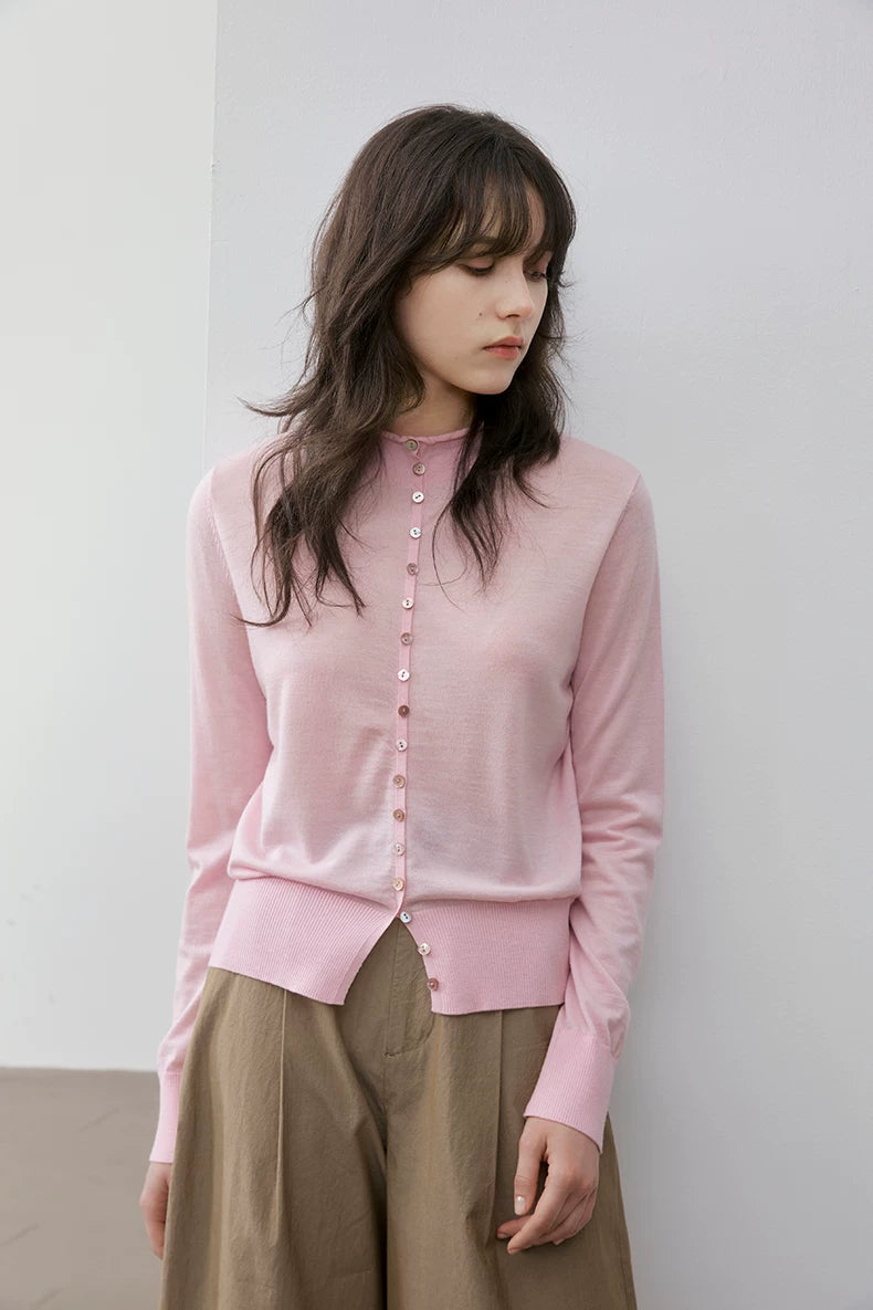 Blush Pink wool cardigan, front view on model