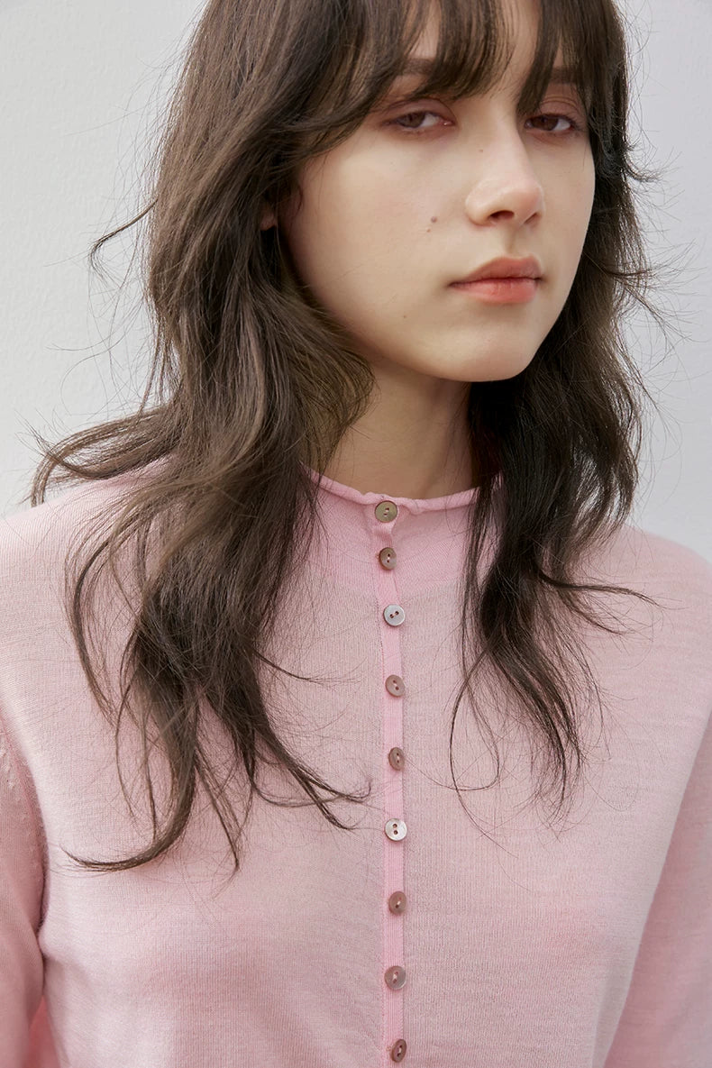 Blush Pink wool cardigan, close-up of semi-mock neckline and buttons