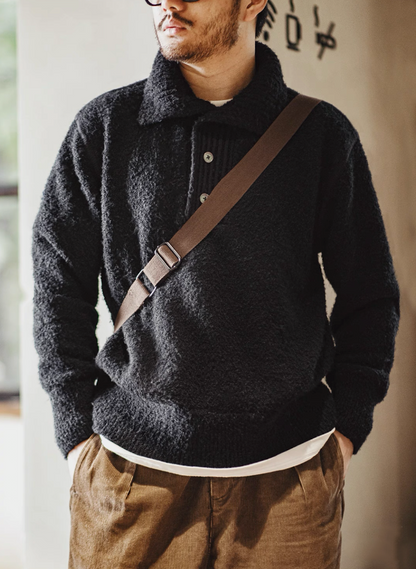 Model wearing crossbody bag over Black Bouclé Polo Sweater