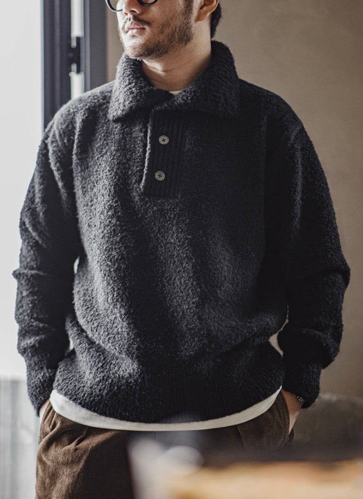 Model wearing Black Bouclé Polo Sweater front indoor view