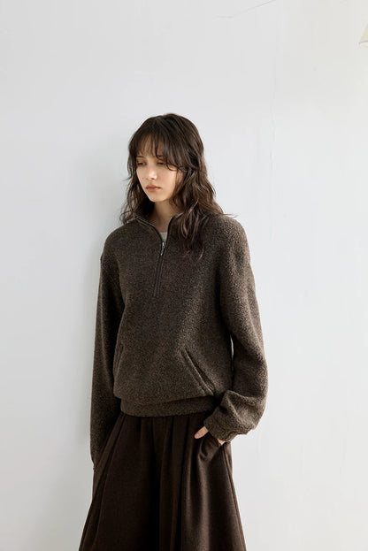 Brown bouclé wool half-zip pullover, front view on model