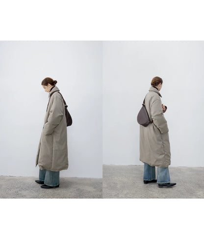 Two side views of a Brown Check long down coat with the collar buttoned up