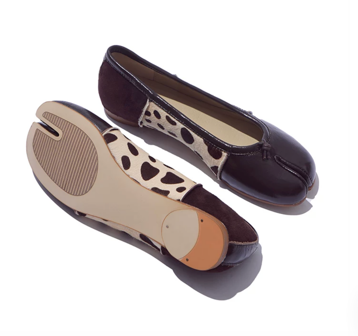 Brown tabi ballet flats showing the split-toe outsole with ribbed tread and heel toplift