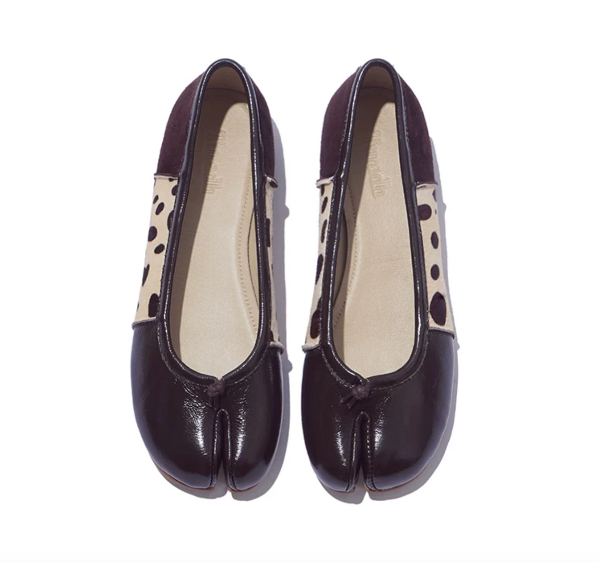 Top-down view of Brown tabi ballet flats showing the split toe, knotted tie, and patchwork upper
