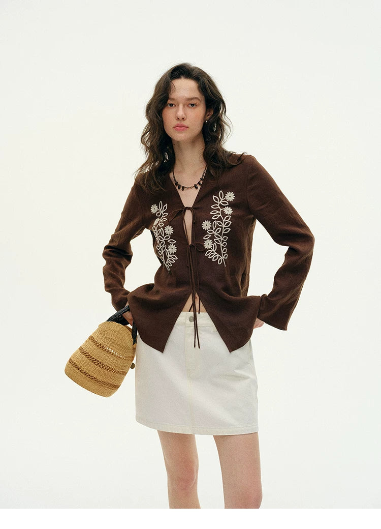 Front view of brown embroidered hemp cardigan showing tie-front V-neck detail