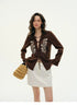 Front view of brown embroidered hemp cardigan showing tie-front V-neck detail