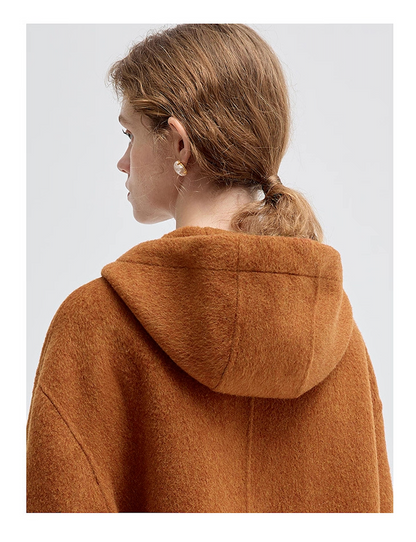 Close-up of the brown hooded coat back, focusing on the hood and shoulder seam details.