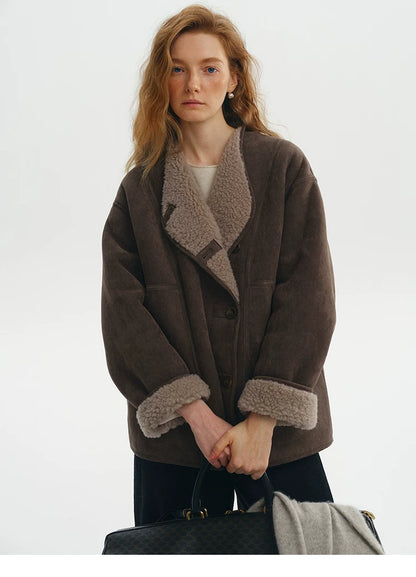 Front view of a Brown faux-suede jacket with folded-back taupe wool lapels and rolled cuffs