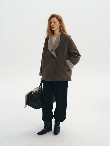 Full-length view of a Brown reversible faux-shearling jacket with taupe wool trim