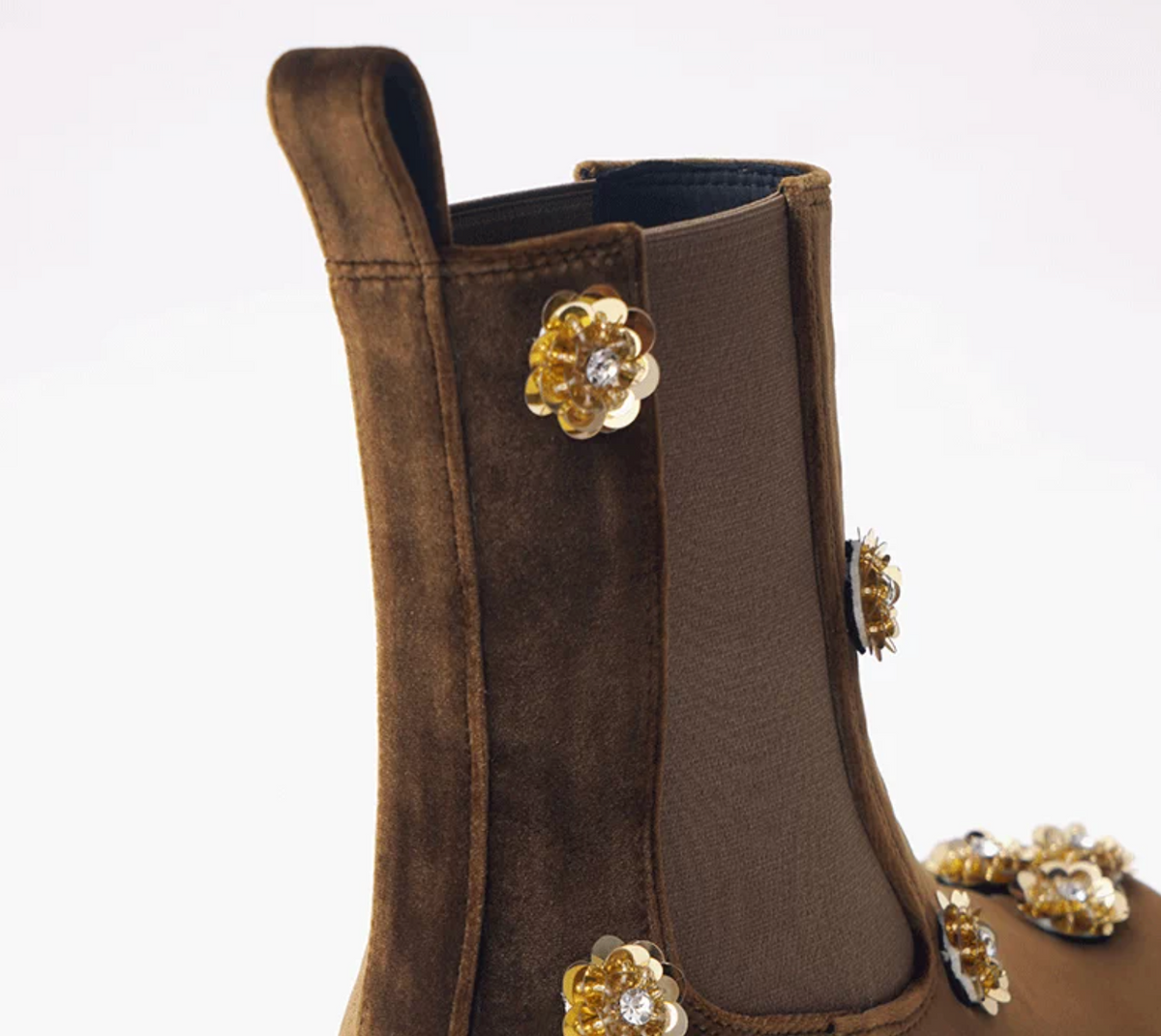 Close-up of a brown velvet boot&