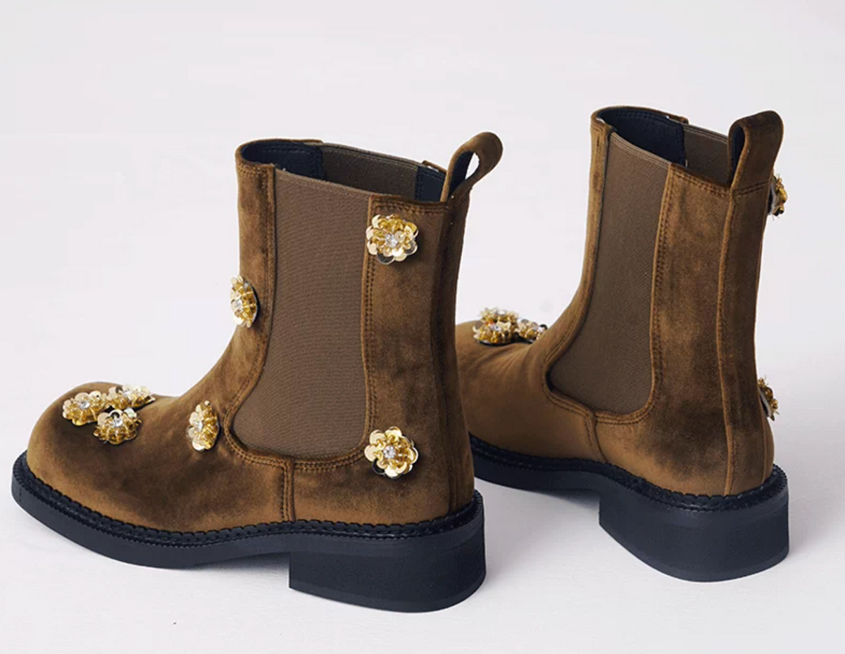 Brown velvet Chelsea boots with gold sequin flowers, back view showing pull tabs