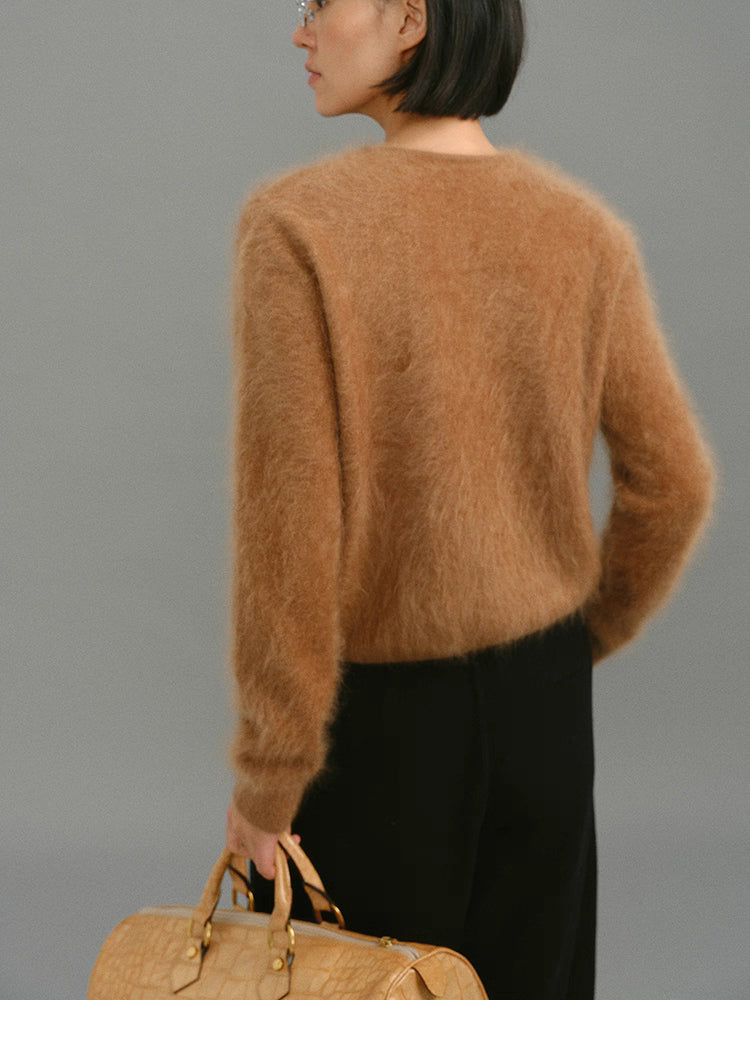 Back view of caramel brushed cashmere cardigan showing airy brushed texture.