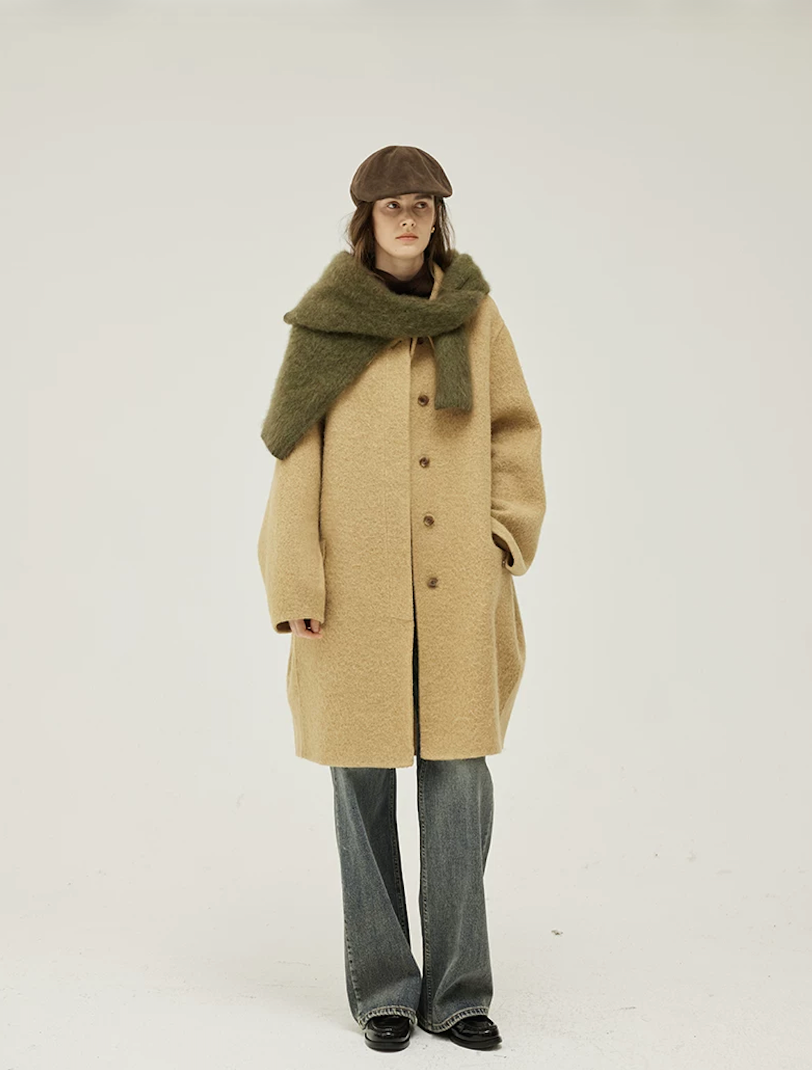 Full-length front view of a Camel double-face wool coat with single-breasted button front