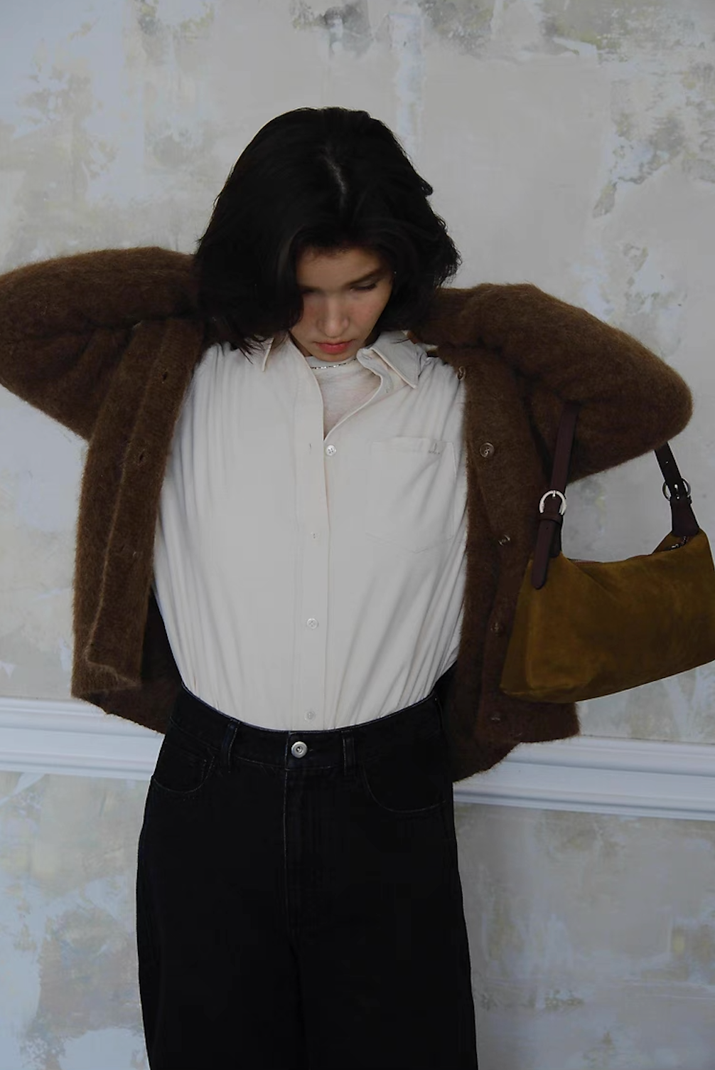 Brown fluffy cardigan layered over white shirt – casual elegant look